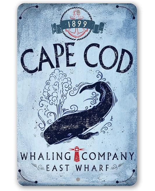 Cape Cod metal sign with blue whale graphic and Cape Cod headline