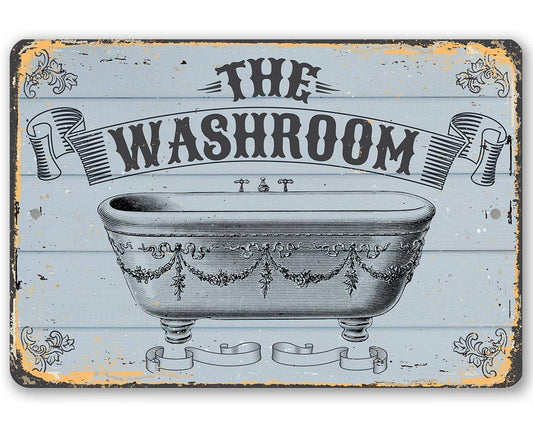 Metal washroom sign with vintage bathtub illustration and ornate frame, distressed light blue