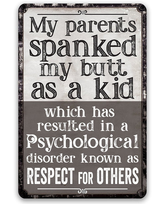 Metal sign with bold lettering: “My parents spanked my butt as a kid”
