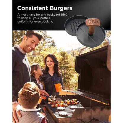 Round hamburger press with wooden handle on grill, circular non-stick cooking surface