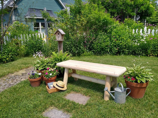 Light wood outdoor bench with slatted seat, farmhouse style, wide top