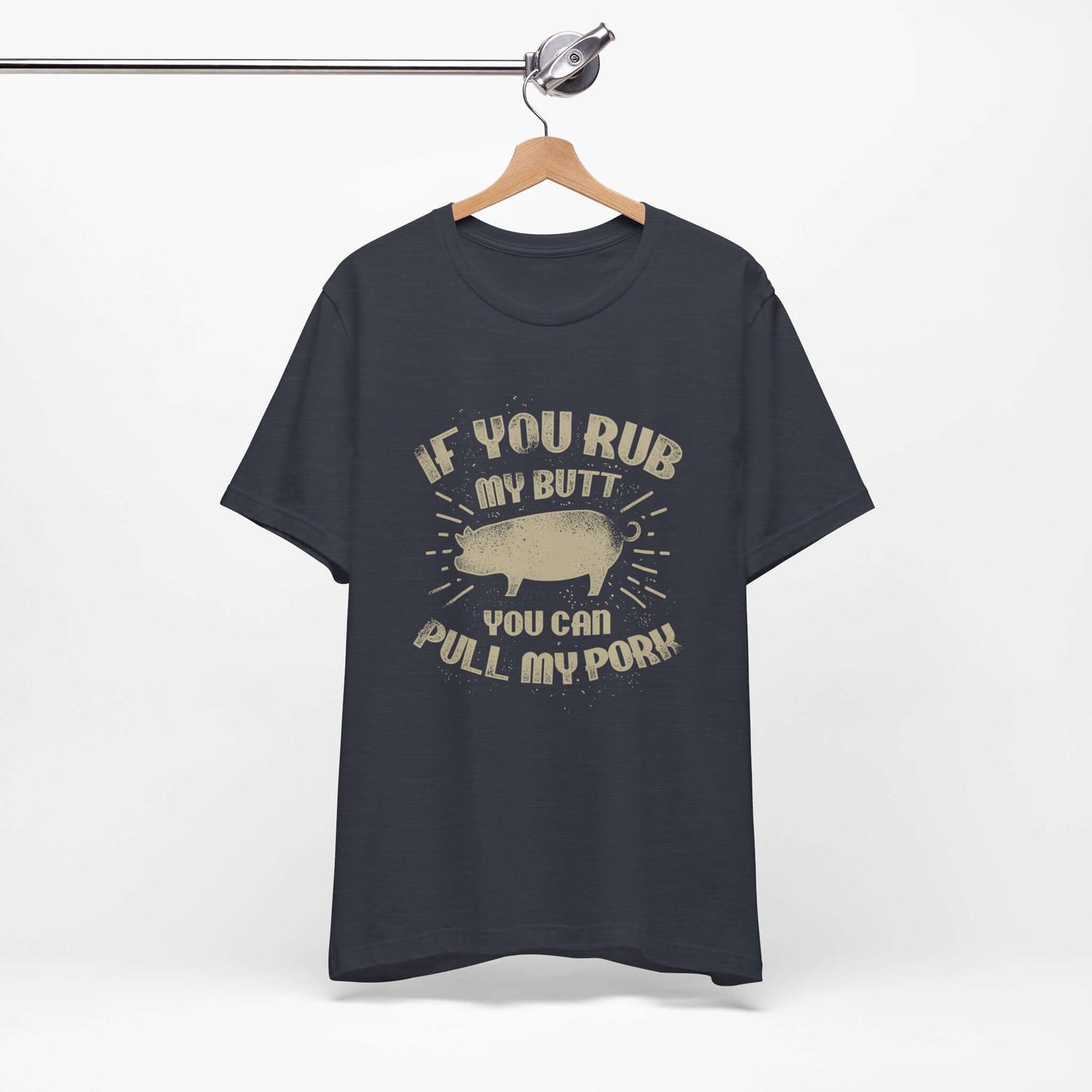 Navy BBQ T-shirt on hanger with centered pig graphic and quote-style lettering