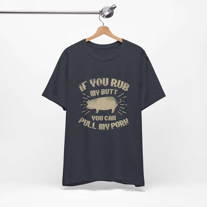 Navy BBQ T-shirt on hanger with centered pig graphic and quote-style lettering