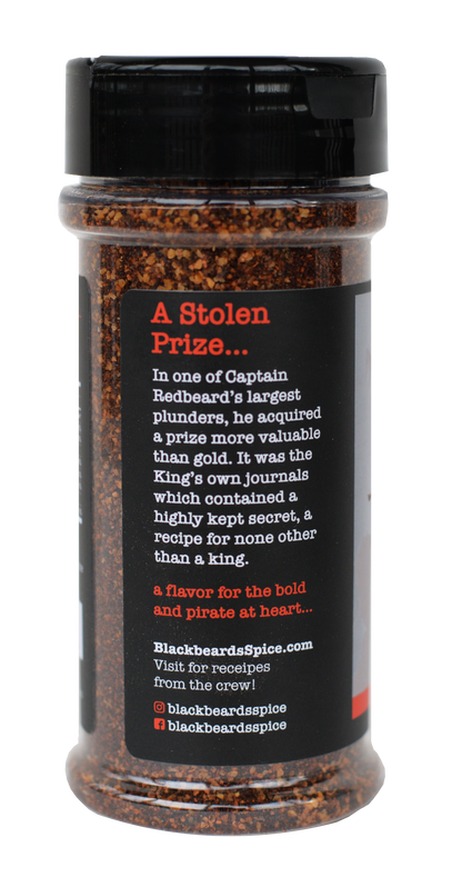 Spice rub seasoning bottle with orange pirate-style text panel