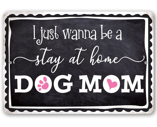 Metal sign with black background text: “I just wanna be a stay at home DOG MOM”