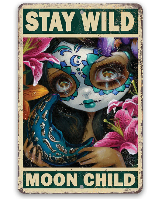 Metal sign with 'STAY WILD' and 'MOON CHILD' text over colorful owl-girl artwork.