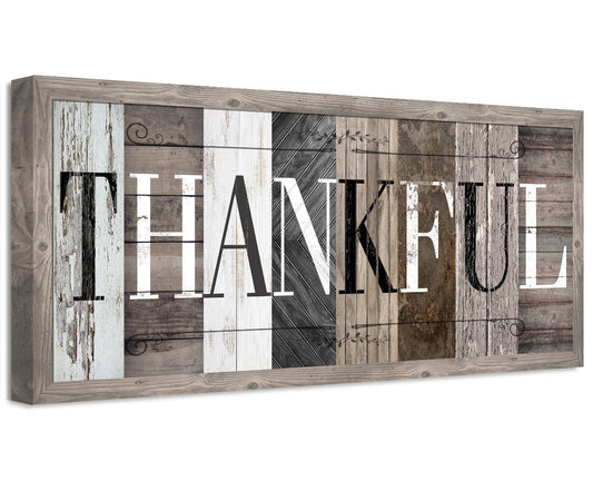 Framed canvas wall art with rustic multi-panel background and large dark word lettering