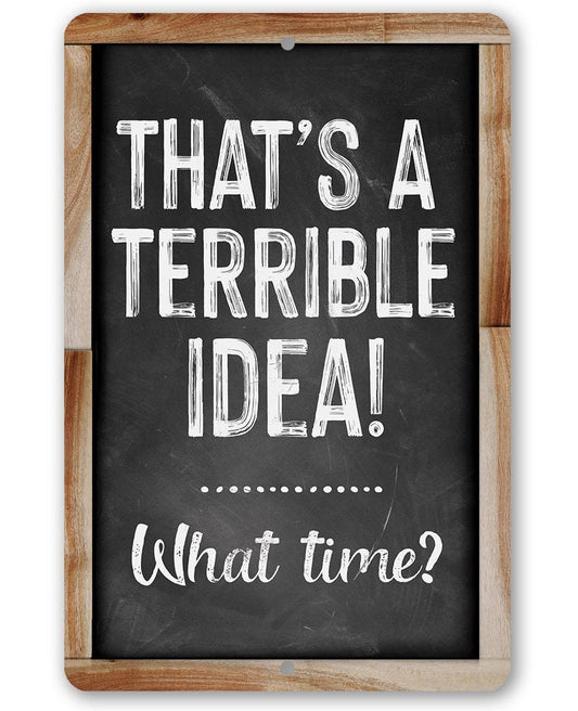 Wood-framed metal sign with text “That's a Terrible Idea! What time?”