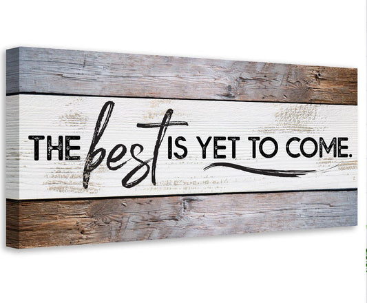 Stretched canvas wall art with "THE best IS YET TO COME" over rustic stripes