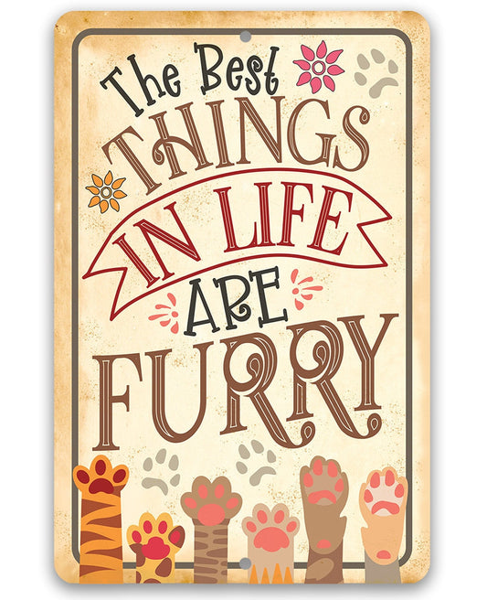 Metal pet sign with paw prints and “Best Things are Furry” lettering