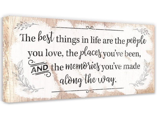 Beige canvas quote wall art with floral leaves and “along the way” text.