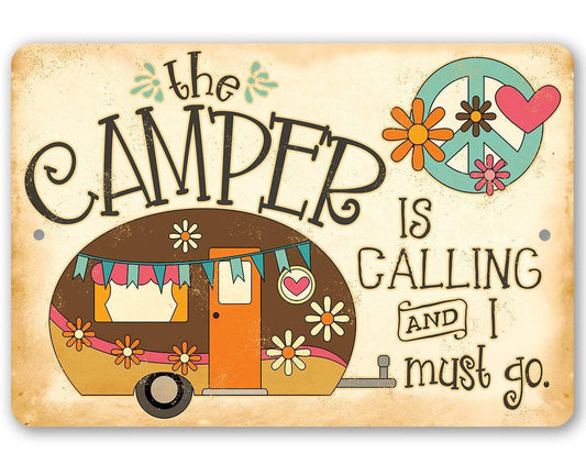 Metal camper sign with colorful trailer graphic and text “The camper is calling”