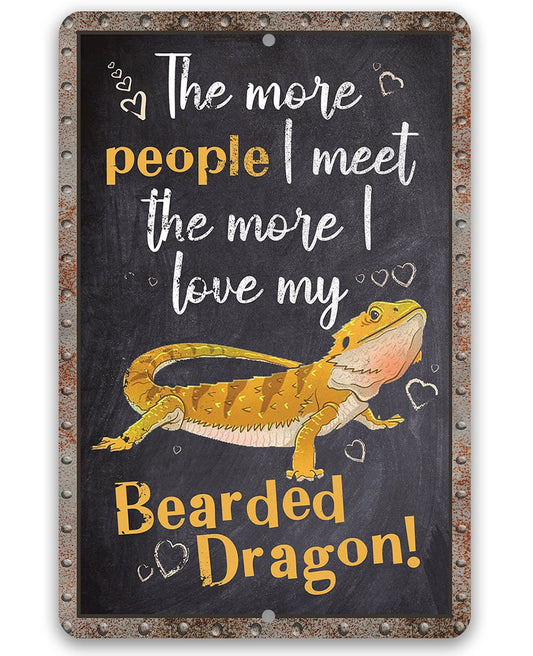 Metal love sign with black background, yellow bearded dragon, hearts, and the words Bearded Dragon!