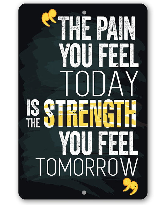 Metal sign with dark background, quote text, and yellow curled icon, rounded corners.