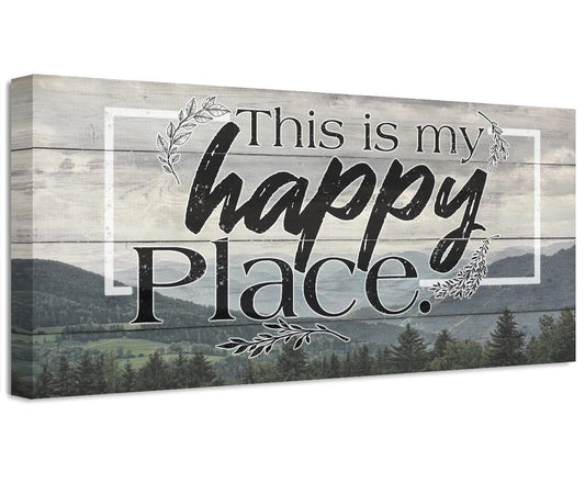 Canvas wall art with black “This is my Happy Place” text over mountain forest scenery