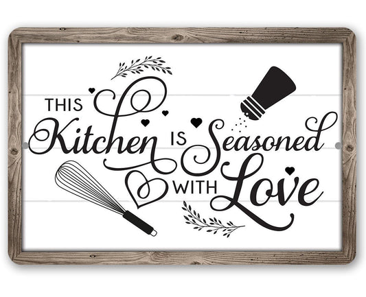Wood-framed metal kitchen sign with 'This Kitchen is Seasoned with Love' lettering