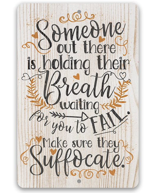 Woodgrain metal sign with heart wreath quote: “Someone out there is holding their Breath.”