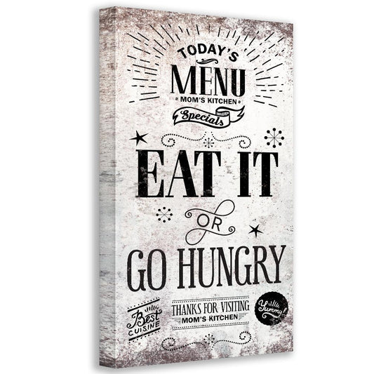 Vertical canvas wall art: 'EAT IT OR GO HUNGRY' in black on gray