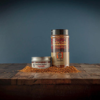 Bourbon smoked togarashi seasoning jar with lid, with loose spice beside it